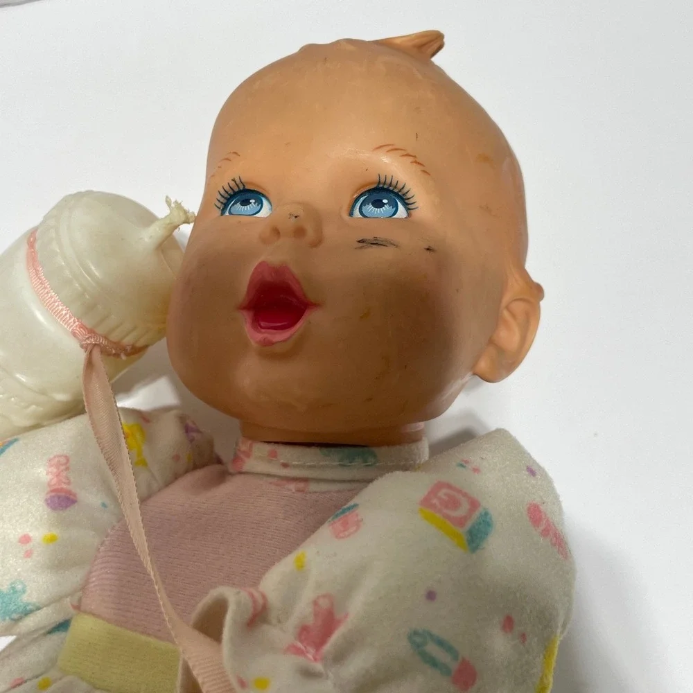 Vintage 1995 Toy Biz Gerber Baby Head Dolls Set of 2 with Bottles Blue Eyes Pink